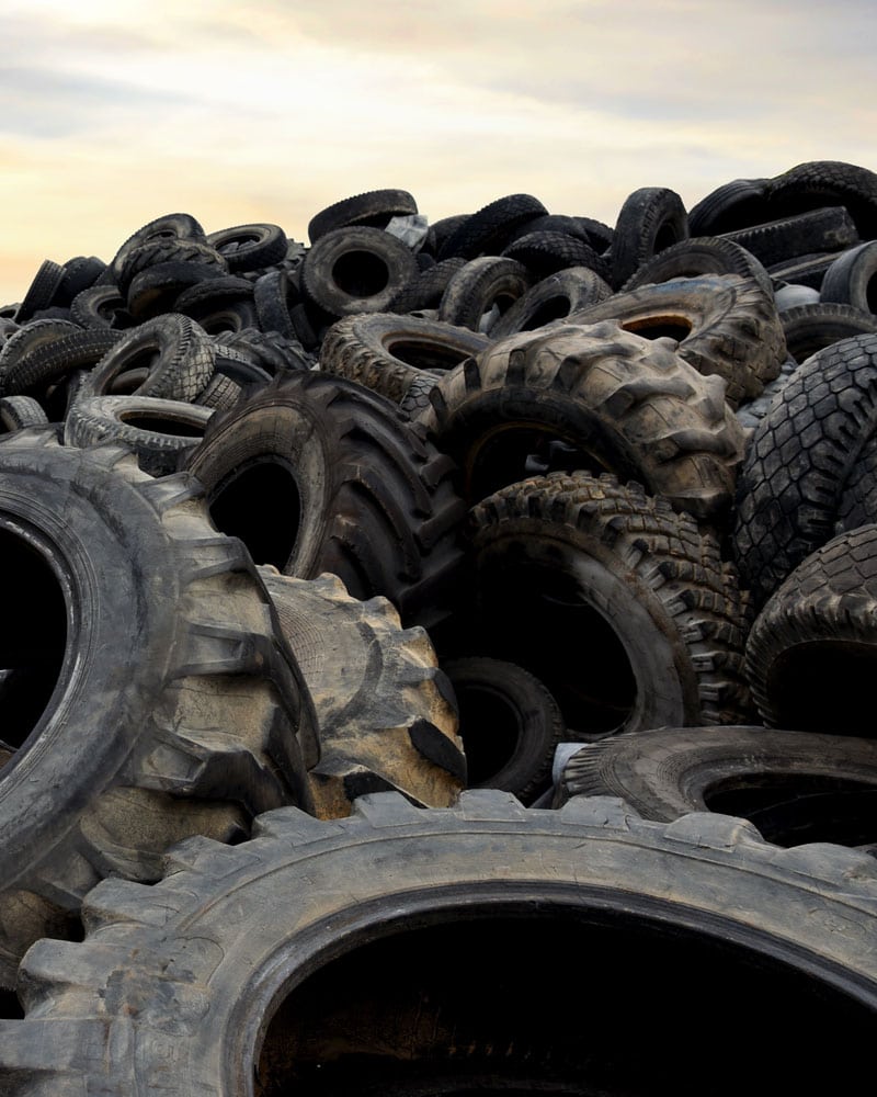 pile of old used tyres ready for scrap metal export